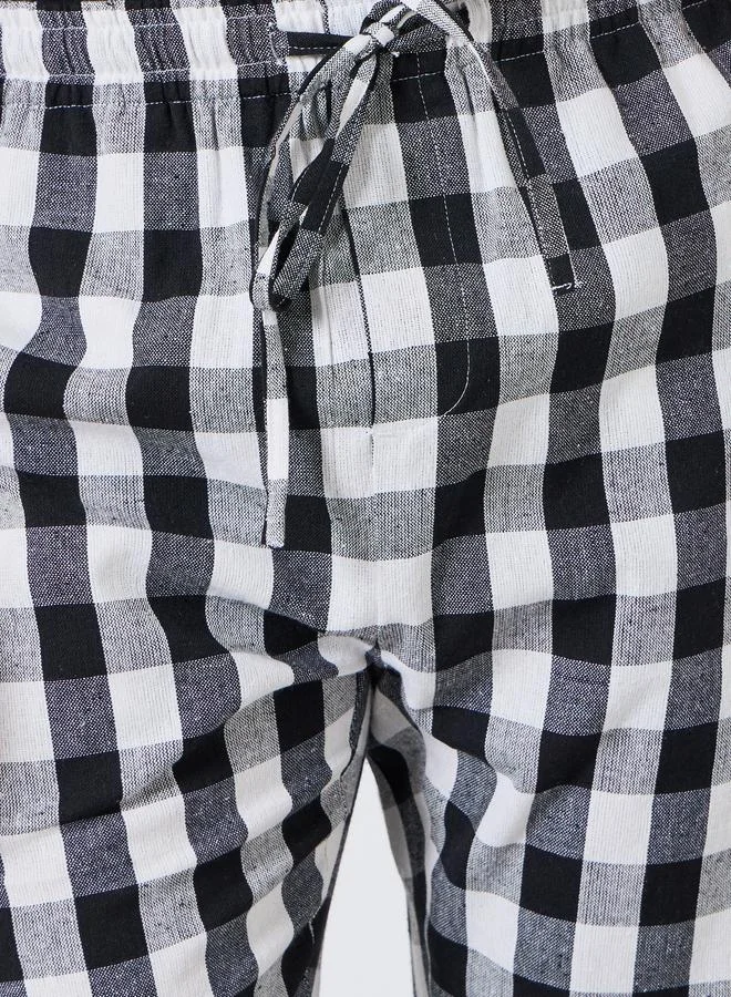 ستايلي بنطال بيجاما رجالي بنقشة مربعات وقصة مريحة